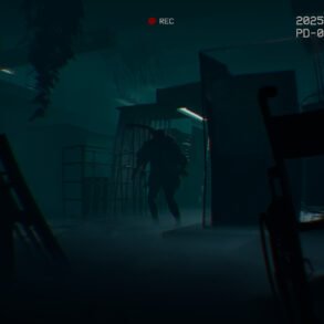 Silhouetted zombie-like figure in a dim, foggy industrial interior with scattered debris and a chain-link fence, plus a video timestamp and red REC indicator at the top.