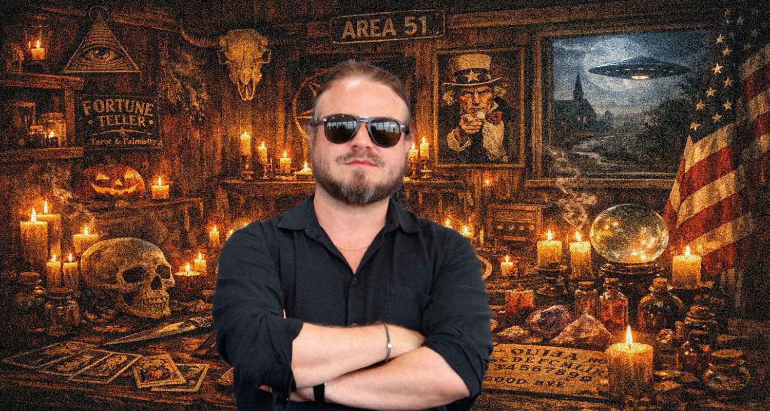 Man with sunglasses and black shirt stands with arms crossed in a dim, occult-themed room filled with candles, skull, and ancient artifacts.