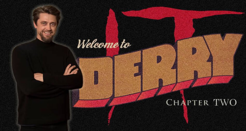 Man in a black turtleneck stands with arms crossed beside a grainy retro-style poster that reads 'Welcome to' and 'Chapter Two' with large gold lettering.