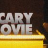 Poster-style image with large gray text 'SCARY MOVIE' across the left, a grainy, yellow-lit background, and a silhouetted figure on the right.