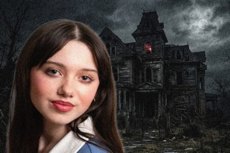 Portrait of a young woman with long brown hair in the foreground, a dilapidated haunted house looming in the background at night.