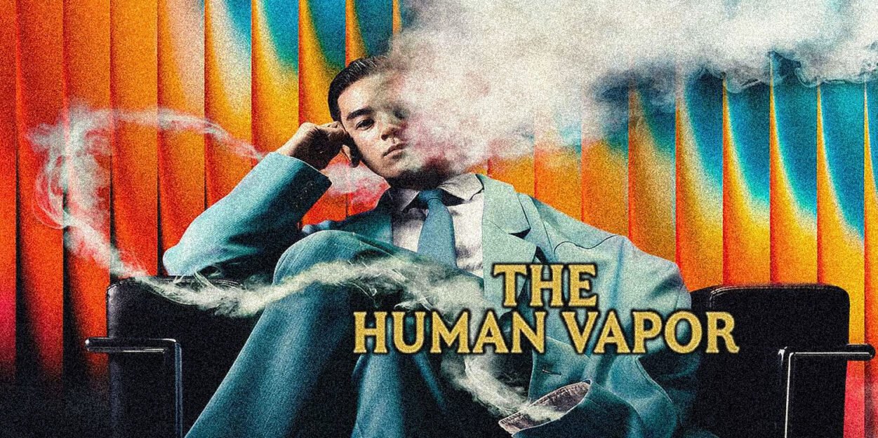 Man in a teal suit lounging in a chair, vapor obscuring his face; bold title 'THE HUMAN VAPOR' across the image.