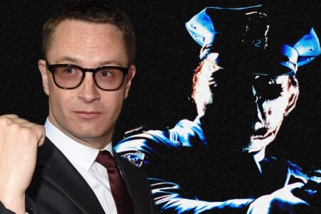 Man in a dark suit and glasses with a raised fist next to a large blue-toned graphic of a police officer