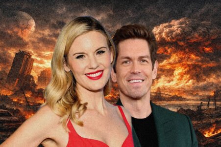 Smiling couple posed in front of a fiery, ruined cityscape backdrop.