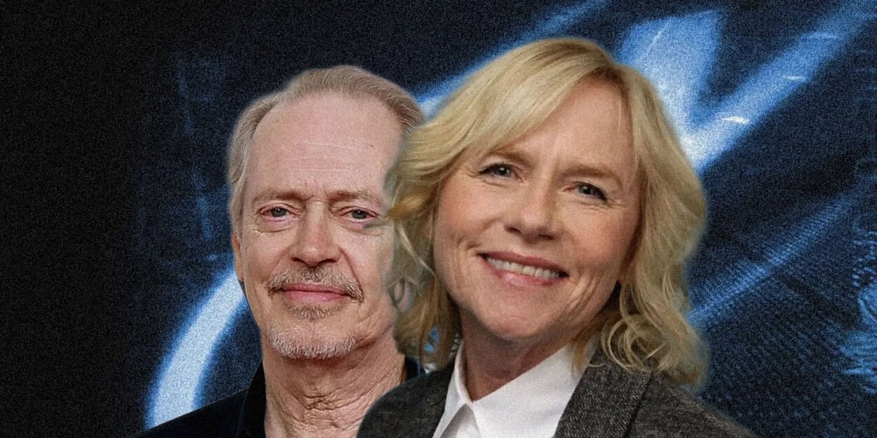 Two smiling adults, a man with light hair and a blonde woman, pose together against a blue abstract backdrop.