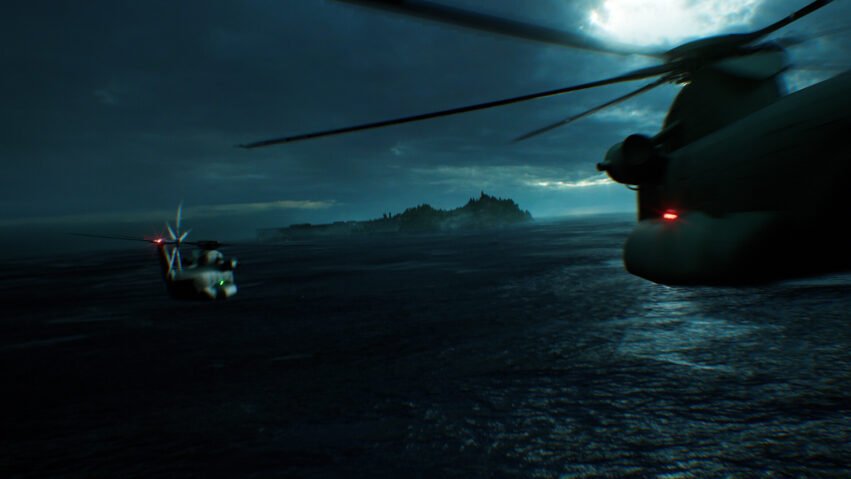 Two military helicopters hover over a dark, choppy sea at dusk, with a distant island and shoreline in the background.