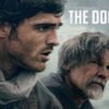 Movie poster for The Dog Stars showing two men in rugged outdoor gear looking to the left, with a stormy sky and a distant building