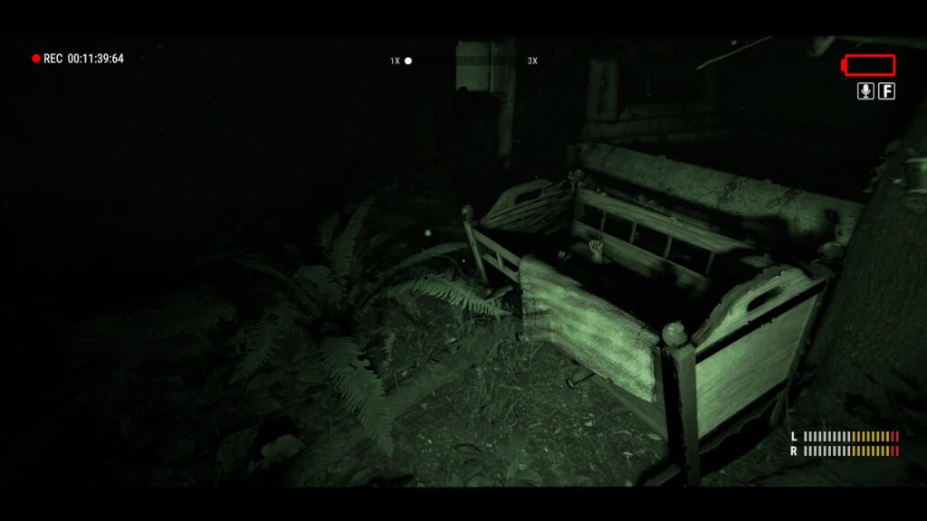 Night-vision view of a ruined bedroom with two broken wooden beds surrounded by ferns and overgrowth, dark and eerie.
