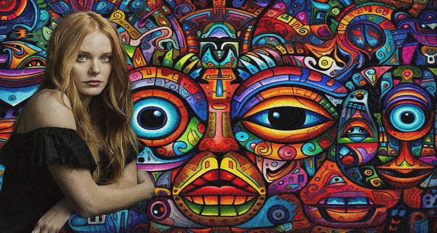 Young woman with long blonde hair in an off‑the‑shoulder black top posed before a vivid graffiti mural of psychedelic faces.